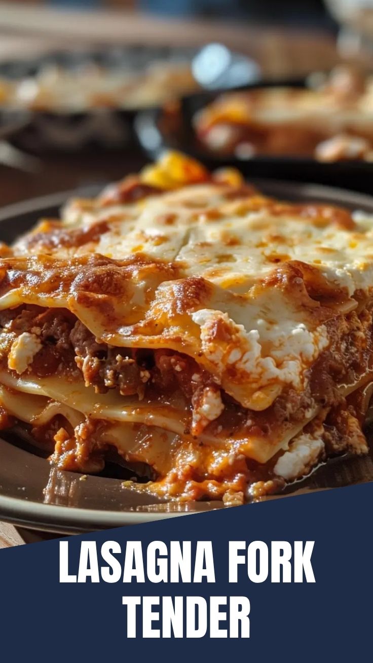A steaming hot pan of freshly baked lasagna with melted cheese on top.