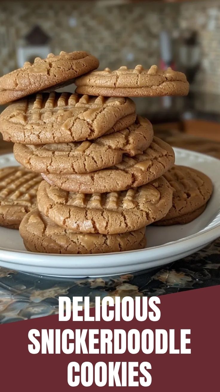 A plate of fresh snickerdoodle cookies, soft and coated in cinnamon-sugar.